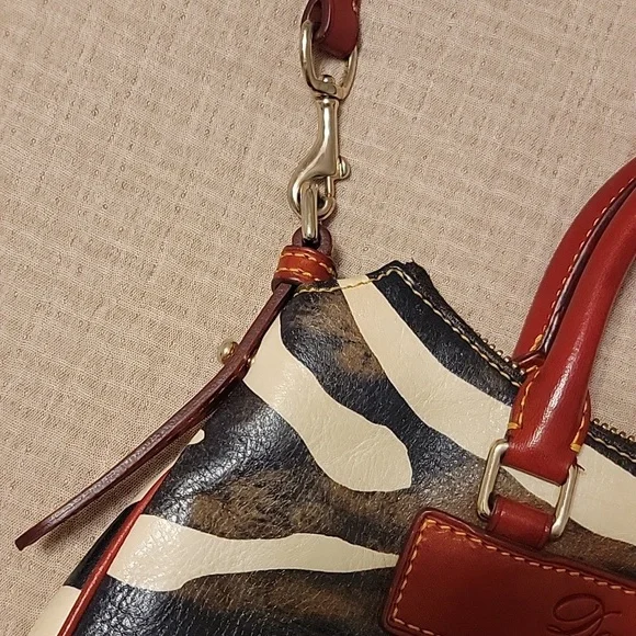 Dooney & Bourke Zebra Print Crossbody Bag with Red Accents - Picture 9 of 11